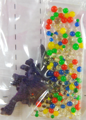 Шарики растущие в воде с фиолетовой фигуркой (SKD-0848)